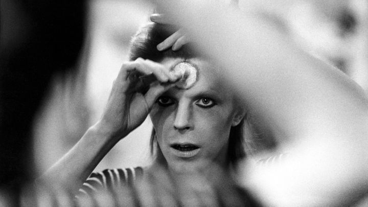 Bowie applies makeup in Aberdeen, Scotland, on May 16th, 1973.