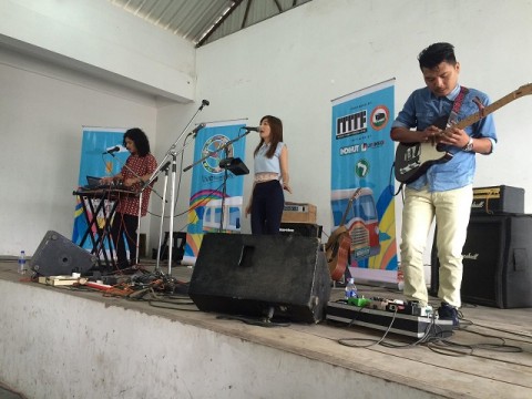 (far left) singer and multi-instrumentalist Sunep Oz on stage at a school in Kohima on the first day of Indibus. Photo: courtesy of Sunep Oz.