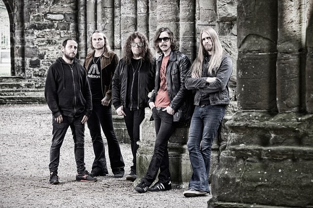 "Everybody's pulling the same direction," says Ã…kerfeldt (second from right) of the current Opeth lineup. Photo : Stuart Wood