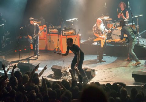 American rock group Eagles of Death Metal perform on stage on November 13, 2015 at the Bataclan concert hall in Paris, few moments before four men armed with assault rifles. Photo: MARION RUSZNIEWSKI/ Getty Images 