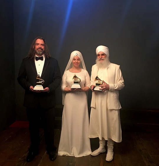 White Sun's Adam Berry, Gurujas and Harijiwan with their Grammy for the Best New Age Album earlier this year. Photo: Courtesy of the artist