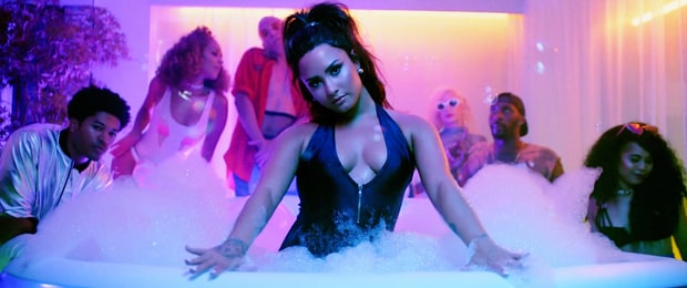 Watch Demi Lovato’s Pool Party DJed By Paris Hilton in ‘Sorry Not Sorry’