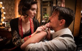 Hollywood movie actors Rooney Mara and Bradley Cooper in Nightmare Alley