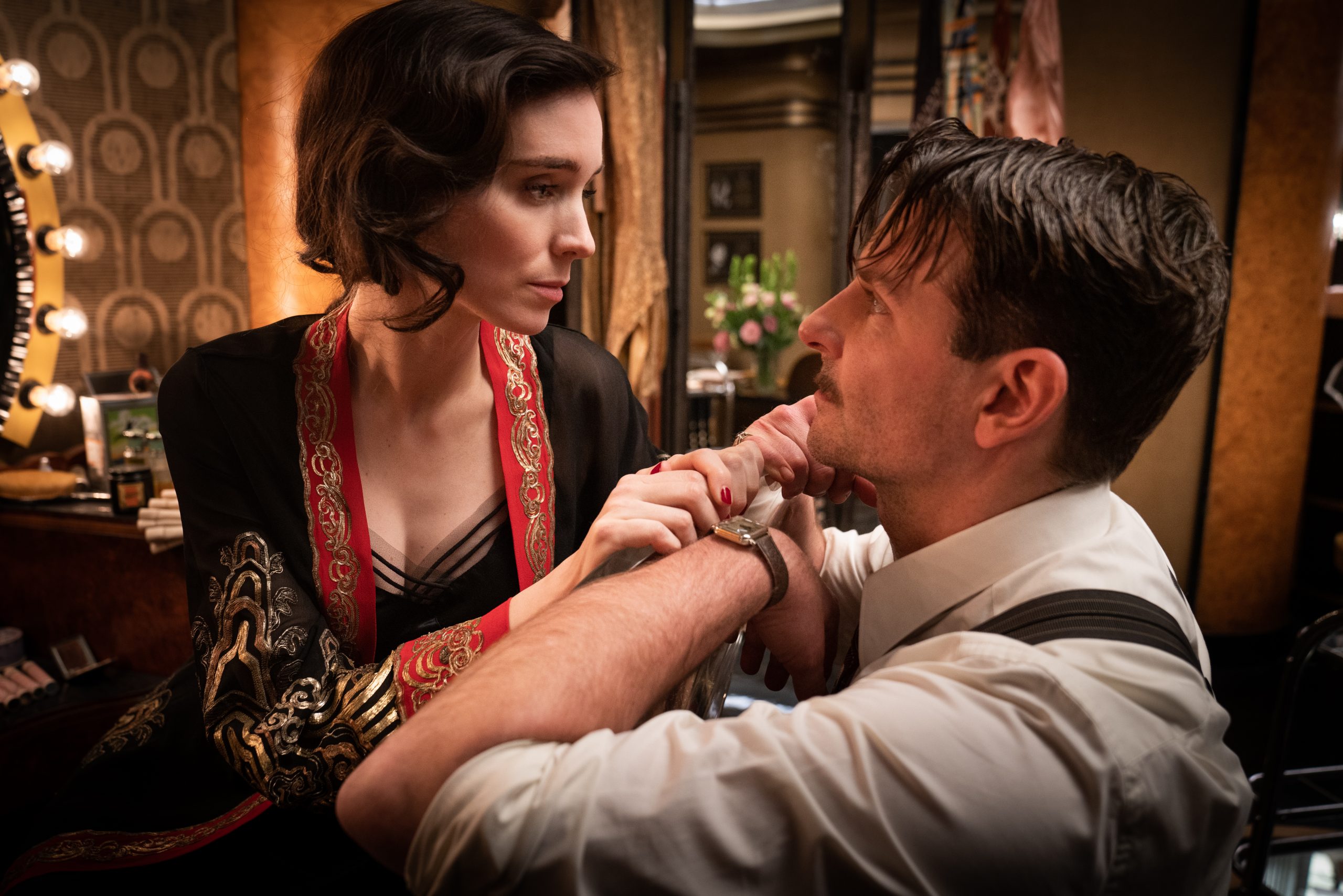 Hollywood movie actors Rooney Mara and Bradley Cooper in Nightmare Alley