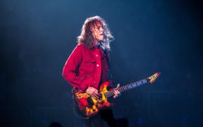 Metallica guitarist Kirk Hammett live on stage in concert