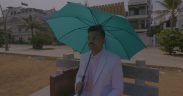 Agaahi Raahi aka Farhan Ahmed in Pondicherry holding umbrella