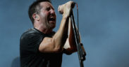 Trent Reznor of Nine Inch Nails sings into the mic