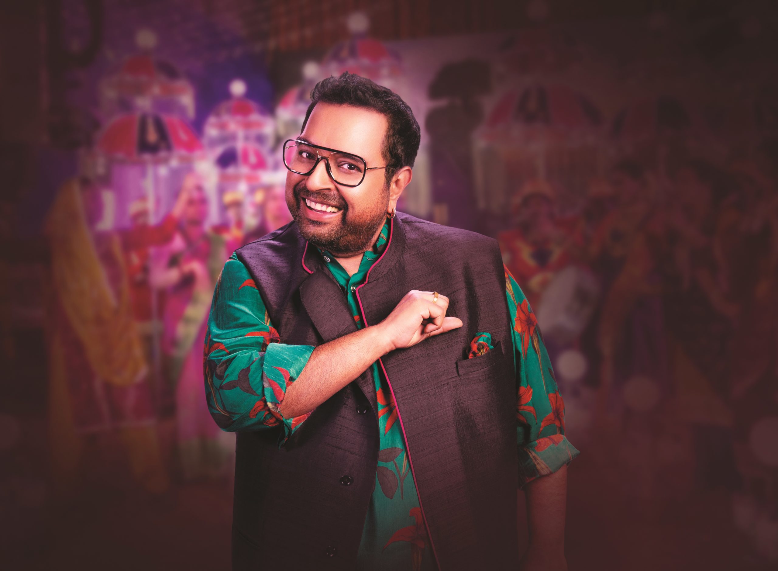 Shankar Mahadevan in green shirt and black vest