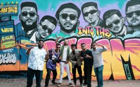 7Bantaiz hip-hop group pose with graffiti promoting their new EP/album Into the Slum