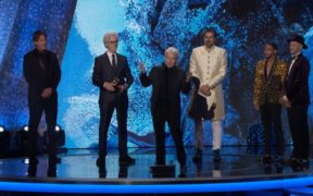 (From second left onwards) Stewart Copeland, Herbert Waltl and Ricky Kej accept the Grammy award for Best Immersive Audio album for 'Divine Tides.'