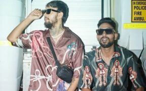 Haryanvi rapper DG Immortals and Delhi rapper Raga wearing print shirts and sunglasses