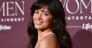 Camila Cabello smiles wearing a pink dress at a gala event in California