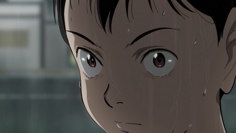 A boy in the rain in a still from anime show 'Pluto'