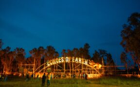 Sign of Echoes of Earth music festival made from recycled and upcycled material