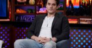 John Mayer seated on the Andy Cohen show Watch What Happens Live