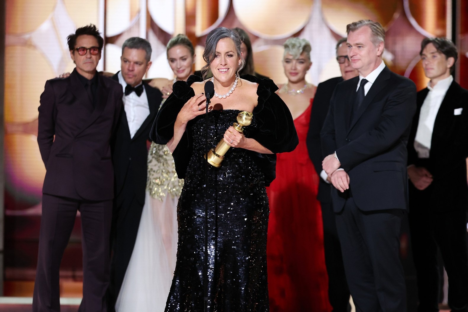 The cast and crew of Oppenheimer accept the Best Picture, Drama award at the Golden Globes 2024