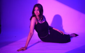 Mumbai artist Shriya poses in a black outfit in the music video for her new song "On My Mind"