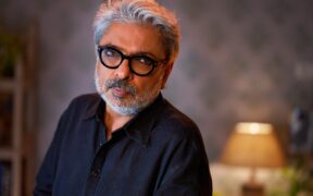 Director and composer Sanjay Leela Bhansali in a black shirt and black glasses
