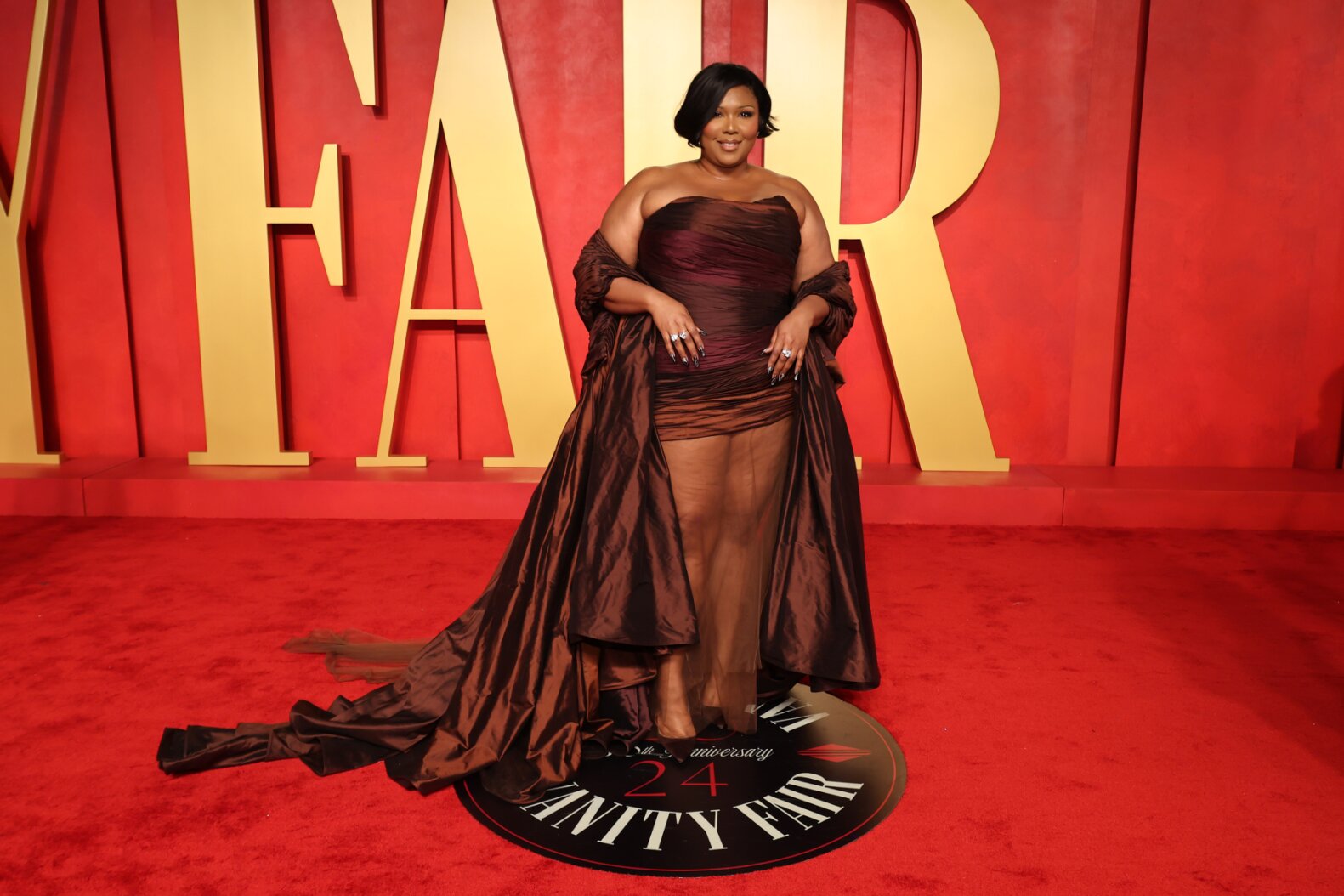 Lizzo Clarifies She’s Not Quitting Music, Just ‘Negative Energy’