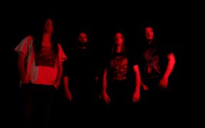 Defeated Sanity band members in red light