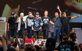 Josh Klinghoffer, Mike McCready, Jeff Ament, Eddie Vedder, Matt Cameron, Stone Gossard and Boom Gaspar of Pearl Jam prepare to bow after performing live on stage at Climate Pledge Arena in Seattle, Washington