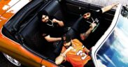 Chani Nattan, Inderpal Moga and AR Paisley seated in a convertible car