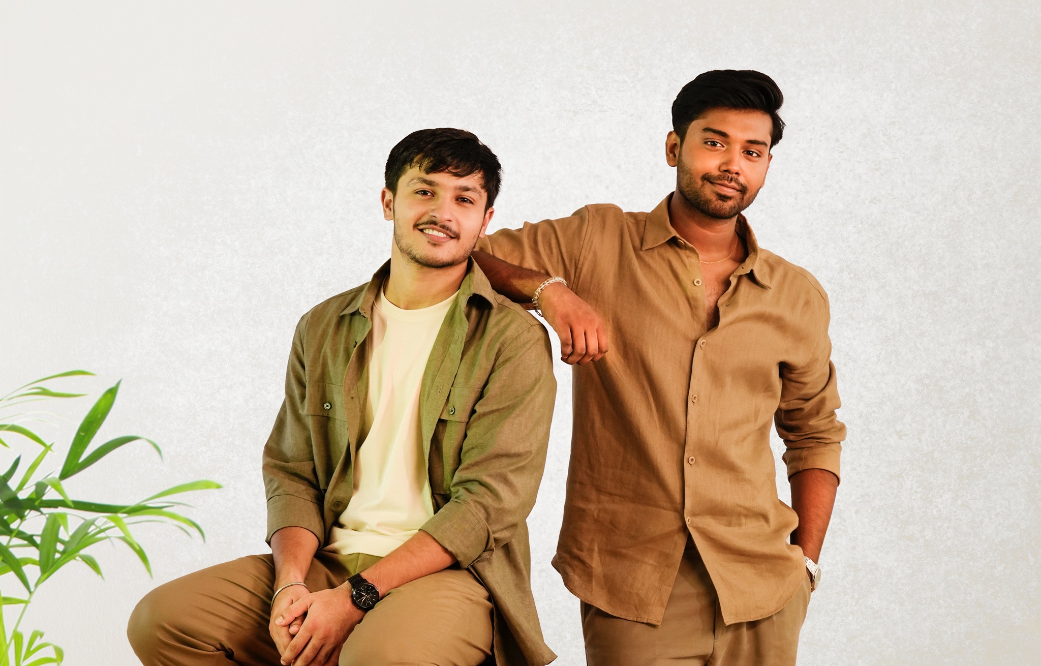 Garvit Priyansh musical duo wearing khaki and green shirts