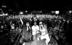 Seedhe Maut and DJ Blunt on stage with fans in the background at a live concert