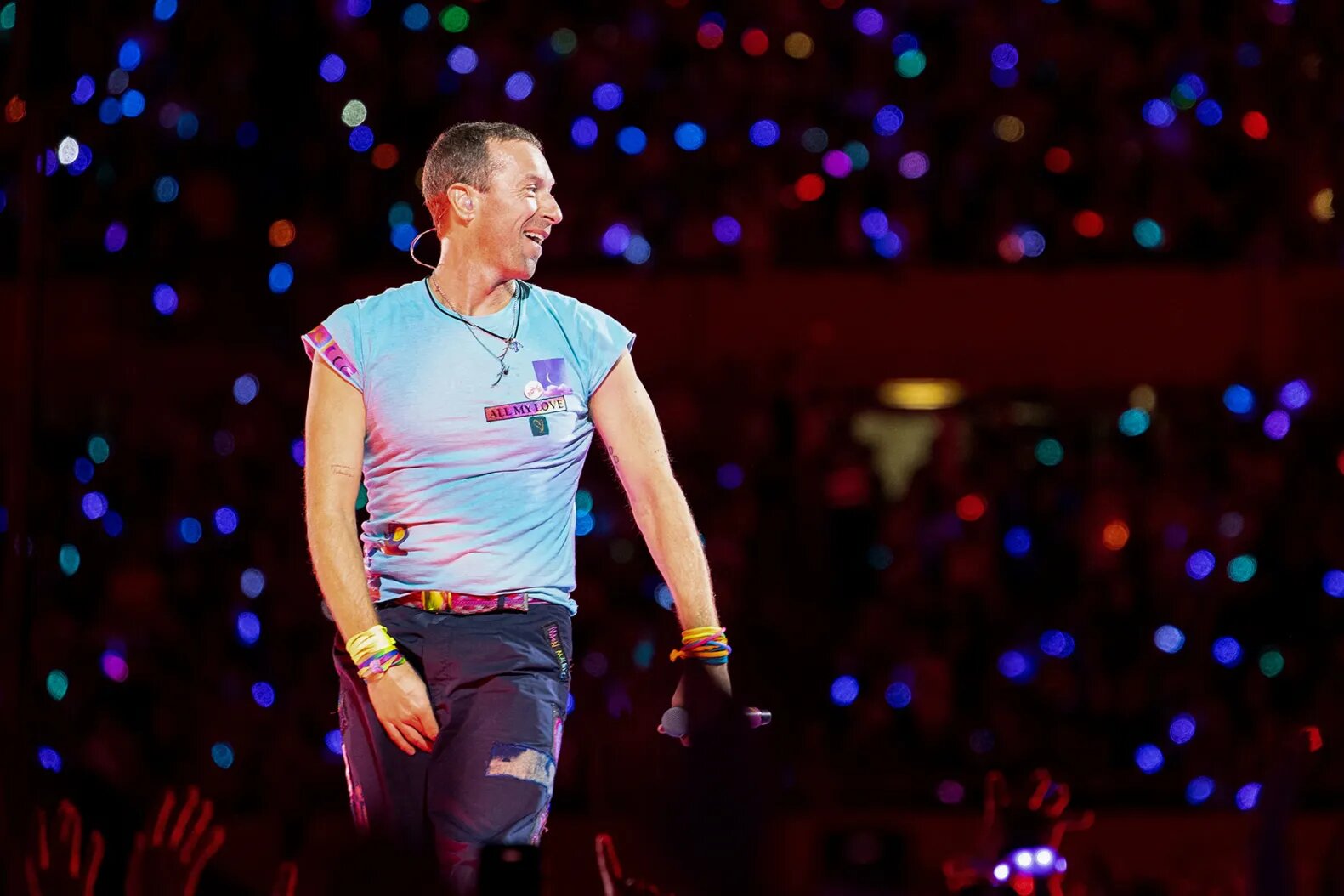 Chris Martin performs on stage during a concert at the Ernst Happel Stadium in Vienna, Austria