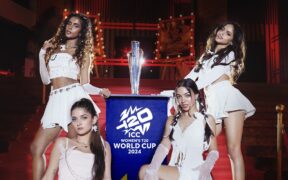 Indian girl group W.i.S.H. members pose with a tropy for the ICC Women's T20 World Cup song