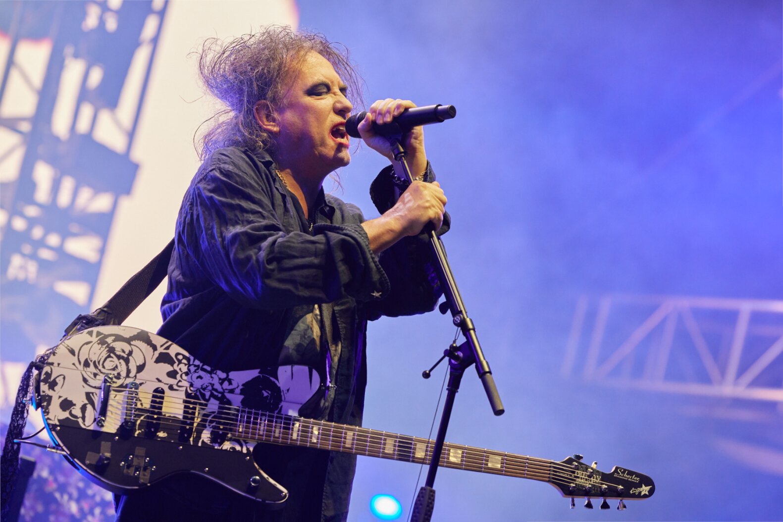 Robert Smith and the Cure performing