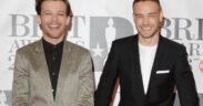 Liam Payne and Louis Tomlinson from One Direction attend the Brit Awards at O2