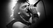 Paul Di'Anno of Iron Maiden singing with mic