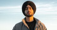 Shubh wearing jacket and black turban and tshirt