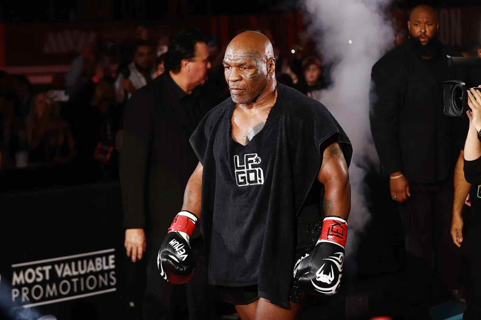 Mike Tyson enters the arena at AT&T Stadium on Nov. 15, 2024 in Arlington, Texas