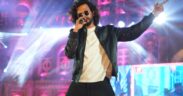 Nakash Aziz performing live on stage at a concert