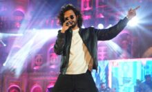 Nakash Aziz performing live on stage at a concert