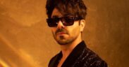 Aparshakti Khurana wearing black jacket and black sunglasses