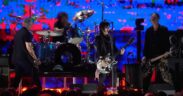 Joan Jett performs with Pat Smear, Dave Grohl, and Krist Novoselic of Nirvana during the FireAid benefit concert at the Kia Forum