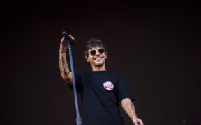 British singer Louis Tomlinson of the former band One Direction performs live on stage during day 1 of Lollapalooza 2024
