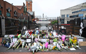 Black Sabbath bridge and bench in Birmingham, England, covered with tributes to Ozzy Osbourne
