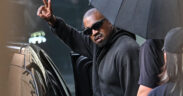US rapper and producer Kanye West waves after arriving at Shanghai Pudong International Airport on July 11, 2025. Kanye West will hold a concert in Shanghai on July 12