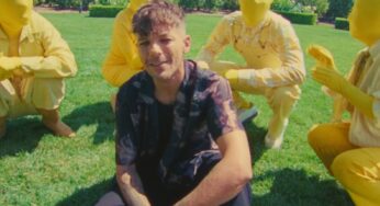 Louis Tomlinson Gets Stuck in a Lemon-Yellow Trance in Silly ‘Lemonade’ Video